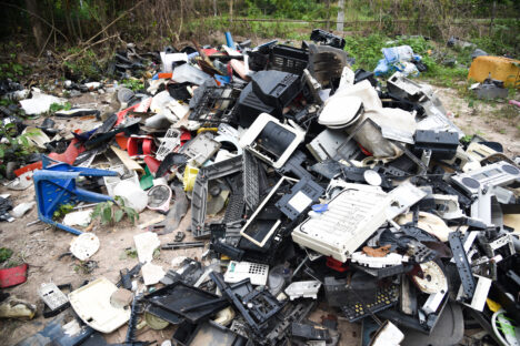 Electronic waste ready for recycling, Pile of used electronic and housewares waste division broken or damage garbage